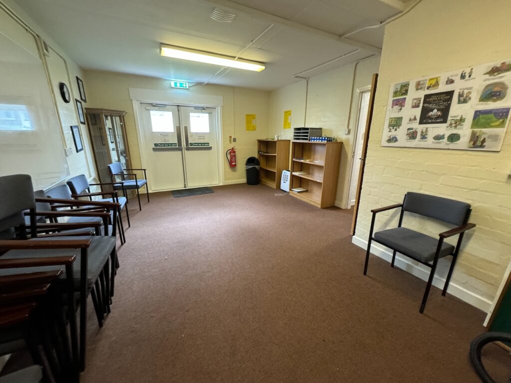 The training room, set out with tables and chairs